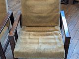 two chairs that are sitting on a wooden floor