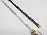 an old sword and a knife on a white surface