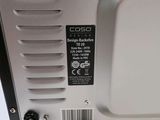 an image of a close up of a computer with a cable connected to it