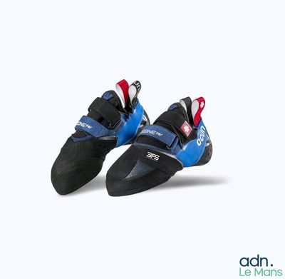 pair of blue and black climbing shoes on a white surface