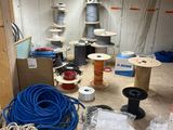 a room that has many different types of wires on the floor
