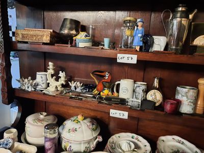 many different types of china on the shelves in this room