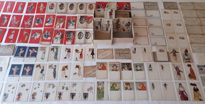 a table with a lot of cards and a box on it