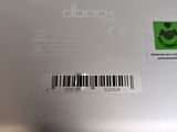 the back of a laptop with a bar code on it