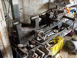 a picture of a workbench in a garage filled with tools