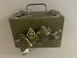 a metal box with a gas mask on it