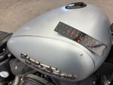 a close up of a motorcycle with a sticker on it