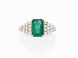 an emerald and diamond ring