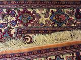 an image of a rug with fringes on top of it