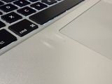 a close up of a laptop keyboard on a table
