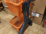 a plastic shopping basket sitting on a stand in a store