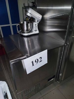 stainless steel counter top with a mixer on it and a price tag on it