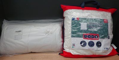 two bags of pillows and a bag of pillows on a shelf