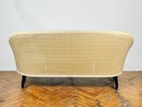 an image of a couch on a parquet floor