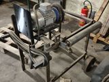 a man that is working on a machine in a garage