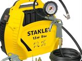 a close up of a yellow and black air compressor on a white background