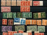 an image of a collection of postage stamps on a black surface