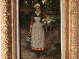 painting of a woman with a watering can in a gold frame