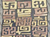 an image of a rug with a pattern on it sitting on a floor