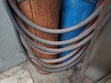 a blue and red hose attached to a blue and red tube