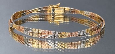 two tone gold and silver bracelet with a square clasp