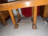 a wooden table with a red cloth on it