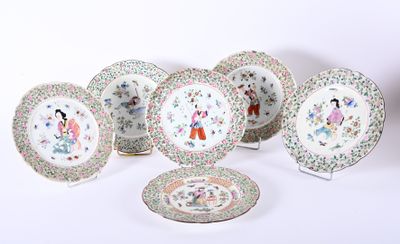 several plates with different designs and designs on them on a white surface