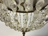 a chandelier that has a lot of crystals hanging from it