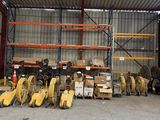 a large warehouse with a lot of pallets in it