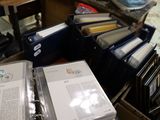 a lot of folders that are sitting on a table