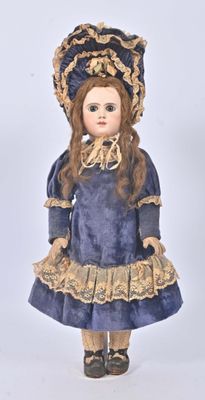 a doll that is wearing a blue dress and a hat