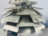 a large metal object that looks like a pineapple