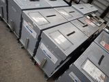 a lot of metal boxes stacked on top of each other