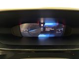 a close up of a car dashboard with a digital display