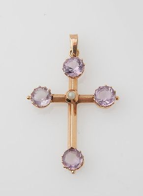 an image of a cross with amethorate stones on it