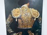 une image représentant un tableau d'un torero vêtu d'une tenue dorée et noire