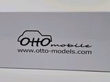 an image of a white box with a black logo on it