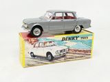 a small toy car sitting on top of a box