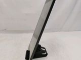 a close up of a tablet computer on a stand on a white surface