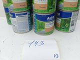 four cans of astrall echappee on a table with a note