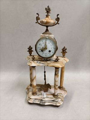 a clock that is sitting on top of a table