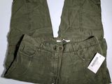 an image of a pair of olive green pants with a tag on it