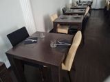 a long table with place settings and place settings on it
