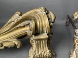 two statues that are sitting next to each other on a table