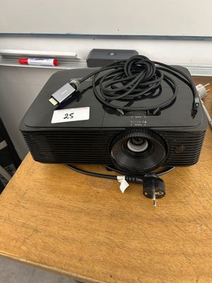 an image of a projector sitting on top of a wooden table