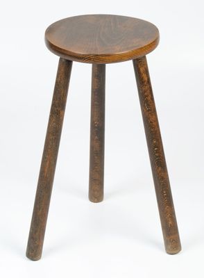 an image of a small wooden stool on a white background