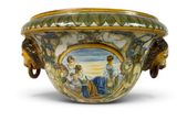 a large bowl with a painting on the side of it