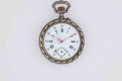 an antique pocket watch with roman numerals and roman numerals on the face
