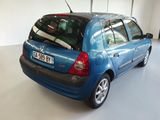 a blue car that is parked in a garage