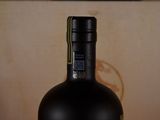 a bottle of wine that is sitting on a table